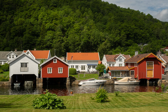 Coastal town. Red and white garages for boats  in Norway