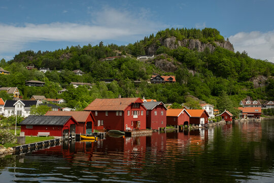 Coastal town. Red garages for boats  in Norway