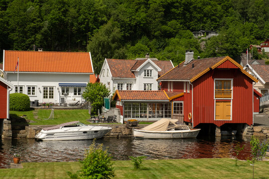 Coastal town. Red and white garages for boats  in Norway