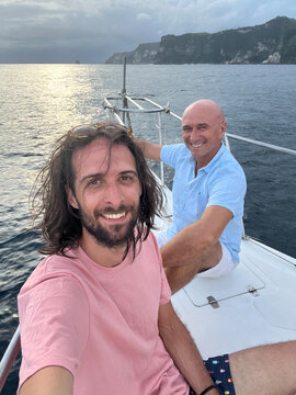 Selfie of a father and son at boat trip travel UGC