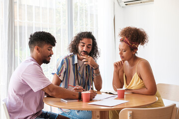 Entrepreneurs working on project at office