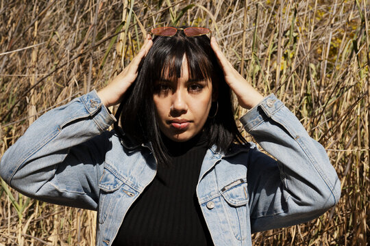 Portrait of woman outside in park