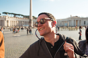 Smiling man with friend reflected on sunglasses