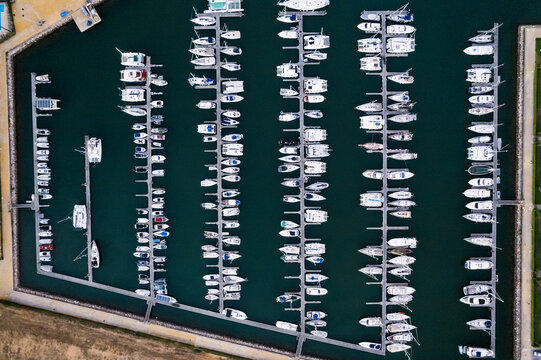 Rows of modern yachts moored in port in Portugal