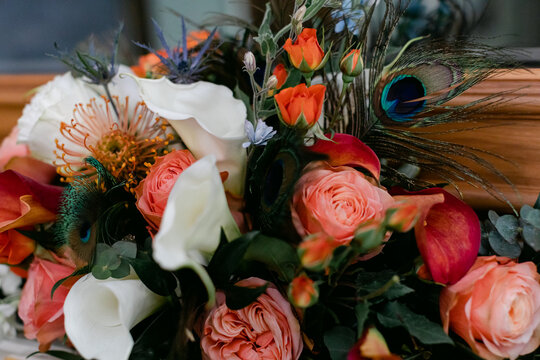 Colorful Bouquet with Peacock Feathers and Flowers