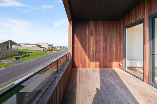 Elevated front balcony of timber home