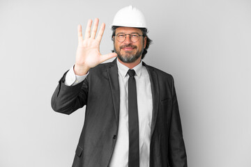Young architect man with helmet over isolated background counting five with fingers
