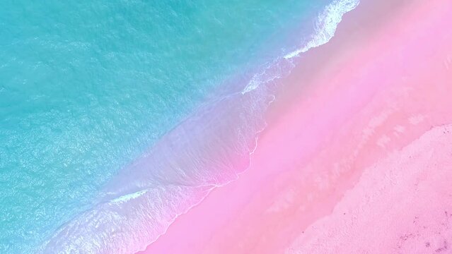 Beautiful waves Foaming and Splashing on the pink beach sand. Ocean sea pastel color. Beautiful waves in open sea at Phuket Thailand Travel and tour background