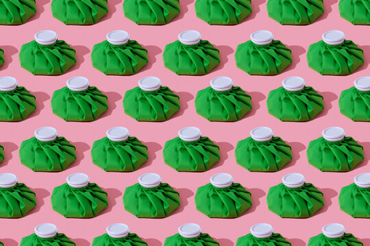 green ice packs on a pink background