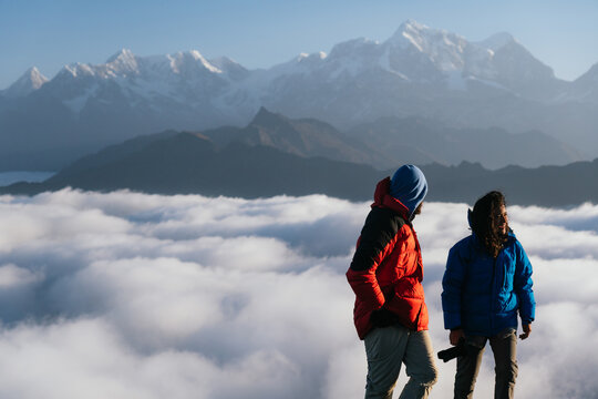 Couple a hikers on top of mountains