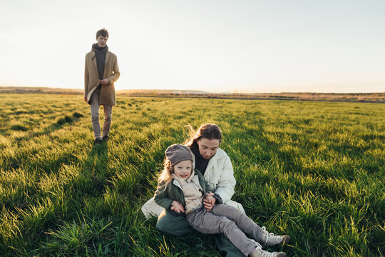 Mother, father and child in the feilds