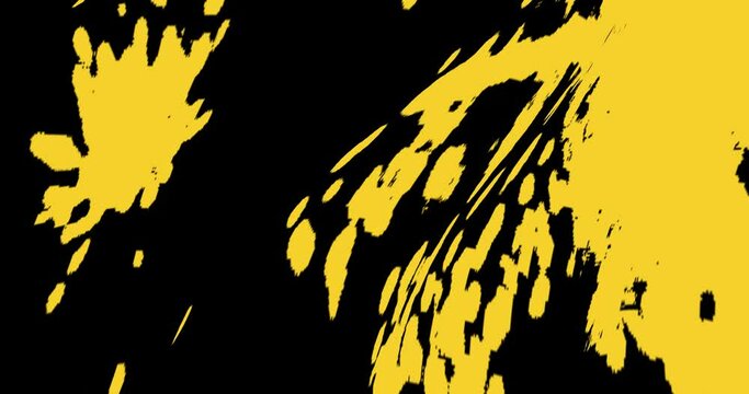 Shimmering yellow spots on a black background. Abstract blots twitching in space.