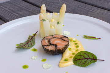 Salmon mosaic with white asparagus in hollandaise sauce and shio koji