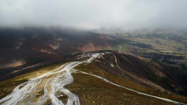 aerial view of travel landmark autumn mountains with snow