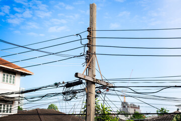 Electrical cables and communication wires on electric pole