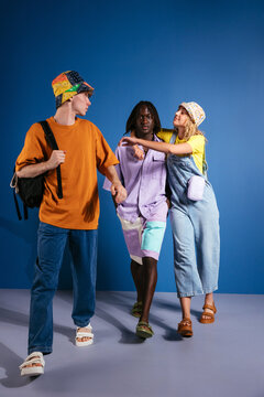 Diverse trendy youngsters in studio