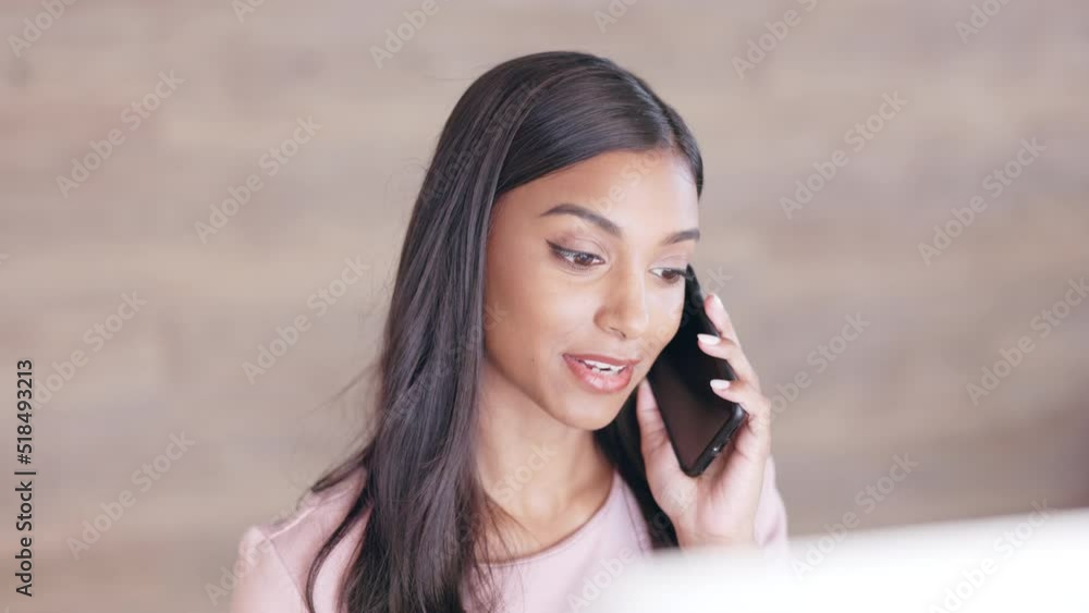 Aufkleber Cheerful young receptionist scheduling appointments and confirming meetings with clients in an office. Secretary talking on a phone while working on a computer at a front desk.