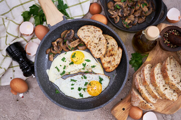 Close up view of the fried egg on a frying pan