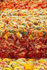 A close up photo of a lot of colorful candies with different flavors