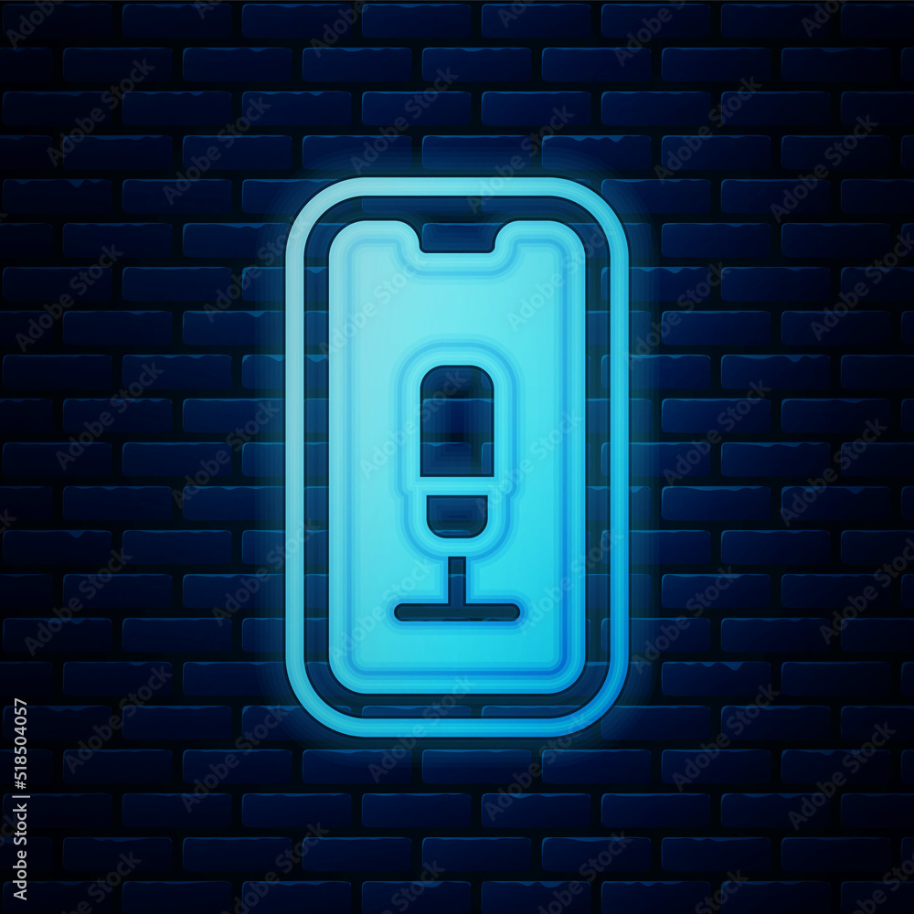 Poster glowing neon mobile recording icon isolated on brick wall background. mobile phone with microphone. 