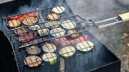 Tasty vegetables cooking on barbecue grill, outdoors. Roasted vegetables, closeup
