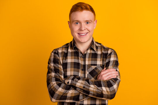 Photo Of Young Handsome Cheerful Man Crossed Hands Smart Attorney Isolated Over Yellow Color Background