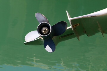 Motor and propeller of a motorboat.