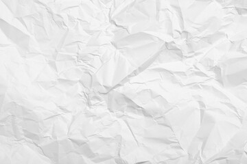 Sheet of white crumpled paper as background, closeup