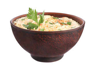 Tasty hummus with parsley and paprika in brown bowl isolated on white