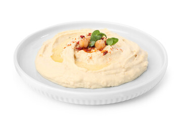 Plate of tasty hummus with garnish isolated on white