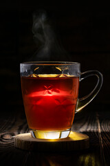 Hot tea with lemon and steam
