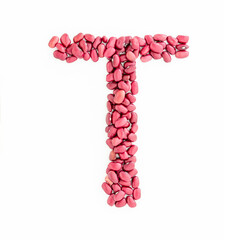 Capital letter T from red kidney beans. Beans font. White background. Bright font for menu or food blog. Lettering design element. Initial cap