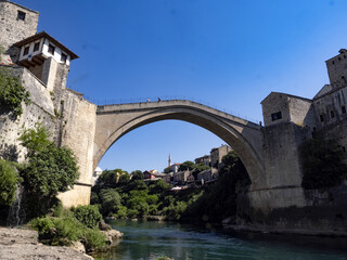 Fototapeta na wymiar Mostar on the Neretva River is one of the largest cities in Bosnia and Herzegovina. The Old Bridge is on the UNESCO cultural heritage list.