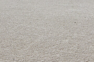 Gravier (ou sable) d'un jardin japonais ou jardin zen en plan rapproché 