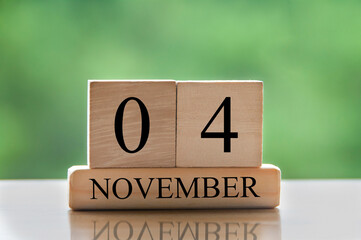 November 4 calendar date text on wooden blocks with copy space for ideas or text. Copy space