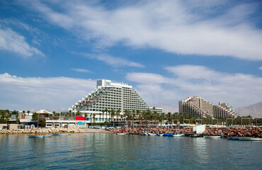 View of the hotels in Eilat in Israel. Resort town on the Red Sea. Hotel complex for tourists and...