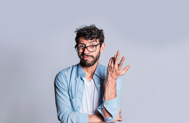Puzzled man gesturing with one hand, Person with puzzled face frowning, Close up of puzzled people...
