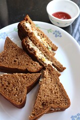Healthy Chicken mayonnaise sandwich served with Tomato ketchup. homemade multigrain brown bread. Copy space.