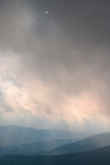 Naklejka na ściany i meble Rain clouds in the Carpathians, overcast Mount Petros.