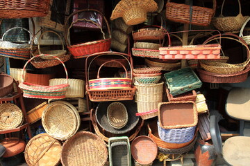 Various shapes and sizes of woven bamboo and rattan baskets sell in traditional markets.