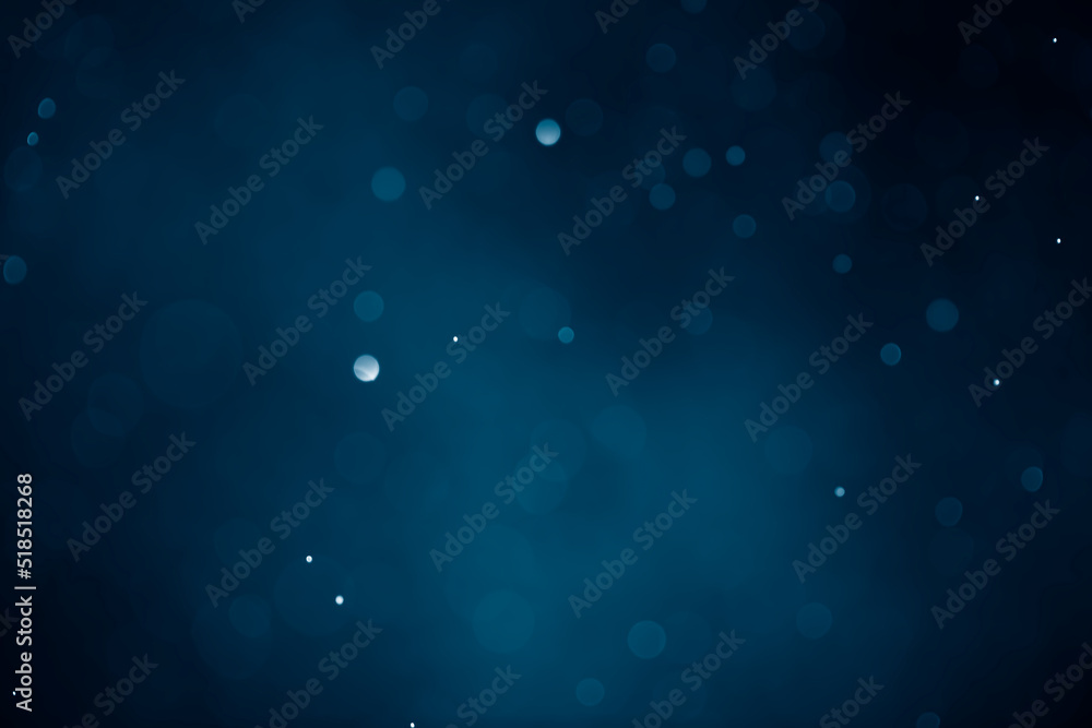 Wall mural dark blue navy bokeh glitter background ideal as wallpaper, banner, christmas theme, brochure etc.,