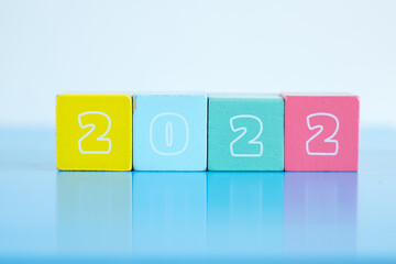 New year concept. Colorful wooden blocks displaying the year of 2024 isolated on white background with copy space for text. 