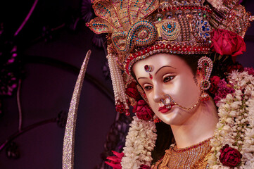 Idol statue of Goddess Maa Durga, happy navratri and dussehra 