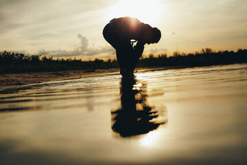 Man going for a dive in the ocean