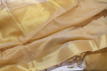 women Gold Colour Dupatta Isolated on White Background