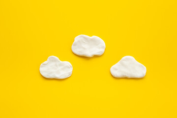 Plasticine white clouds. Weather forecast concept