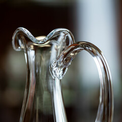 glass antique decanter in luxury interior. crystal clear wine decanter. bohemian glass closeup
