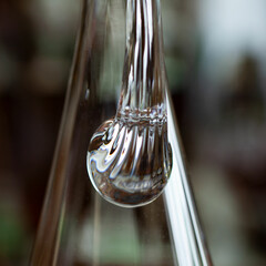 glass antique decanter in luxury interior. crystal clear wine decanter. bohemian glass closeup