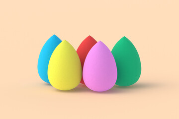 Egg sponges on beige background. Cosmetic accessories. Beauty and fashion. Makeup tools. 3d render