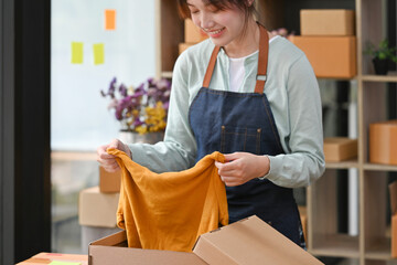 Close up with business owner packing online order to delivery, Freelance woman seller prepare...
